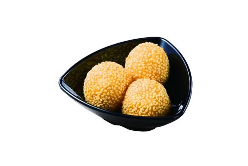 ごま団子。黒い器に盛った3つのごま団子